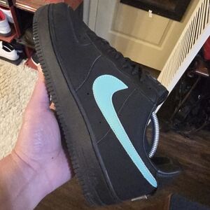 Black Sneakers with Blue Swoosh